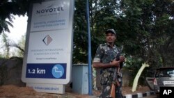 An Indian policeman stands guard in front of the Hyderabad International Conventional Centre ahead of the Global Entrepreneurship Summit in Hyderabad, India, Nov. 22, 2017. 