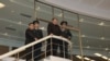 김정은(오른쪽 두번째) 북한 국무위원장이 만리경-1호 군사정찰위성 발사 다음날인 22일 국가항공우주기술총국 평양종합관제소를 방문하고 있다. 
