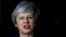 Britain's Prime Minister Theresa May, makes a statement outside 10 Downing Street, in London, Britain, Nov. 14, 2018. 