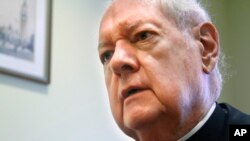 FILE- Cardinal Edward Egan, shown in August 2011, succeeded Cardinal John O'Connor as archbishop and formerly served as bishop of Bridgeport, Connecticut.