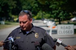 FILE - Bellbrook Police Chief Doug Doherty briefs the media near the family home of Dayton mass shooting suspect Connor Betts, in Bellbrook, Ohio, Aug. 5, 2019.