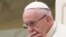 FILE - Pope Francis is caught in pensive mood during his weekly general audience at the Vatican. Francis' papacy has been thrown into crisis by accusations that he covered-up sexual misconduct by ex-Cardinal Theodore McCarrick, Aug. 22, 2018.