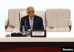Zalmay Khalilzad, U.S. envoy for peace in Afghanistan is seen before talks between the Afghan government and Taliban insurgents in Doha, Qatar, Sept. 12, 2020.