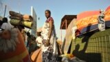 Residents of Juba arrive at the UN compound on December 20, 2013 where they sought shelter. African diplomats made a push for peace in South Sudan on Friday as bitter fighting spread across the world's youngest nation. 