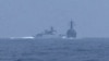 (FILE) A PRC warshipcrosses the path of U.S. Navy destroyer USS Chung-Hoon as it was transiting the Taiwan Strait with the Royal Canadian Navy frigate HMCS Montreal on June 3, 2023.