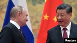 俄罗斯总统普京2月4日在北京出席冬奥会开幕式并与中国领导人习近平会面。（路透社）