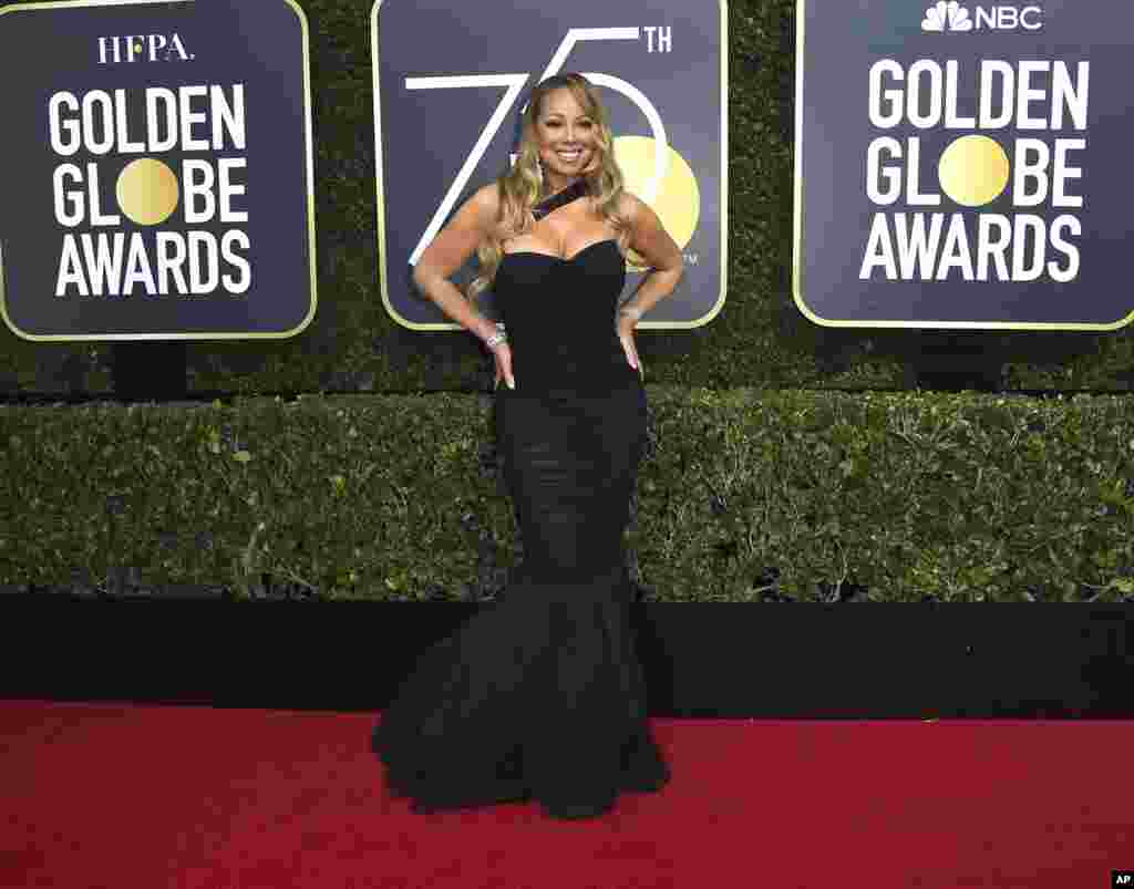 Mariah Carey arrives at the 75th annual Golden Globe Awards at the Beverly Hilton Hotel on Sunday, Jan. 7, 2018, in Beverly Hills, Calif. (Photo by Jordan Strauss/Invision/AP)