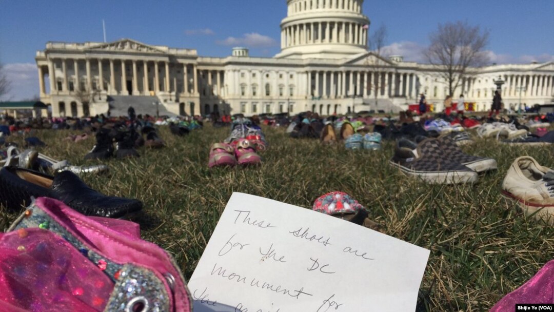 Children's shoes, some from victims of mass shootings, were arranged on the lawn on the U.S. Capitol to protest gun violence in America.