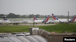 FILE - Cuba's state-owned airline Cubana airplanes are seen parked at the Havana's International Airport in Havana, Cuba, June 14, 2018.