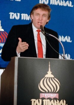 FILE - Real estate mogul Donald Trump announces, during a news conference in New York, the opening of his Taj Mahal Resort Casino in Atlantic City, N.J., Feb. 28, 1989.