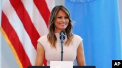 FILE - First lady Melania Trump speaks during a reception at the United States mission to the United Nations, Sept. 26, 2018, in New York.