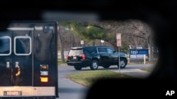 A motorcade with President-elect Joe Biden aboard arrives at Delaware Orthopedic Specialists to see a doctor, Nov. 29, 2020, in Newark, Del. 