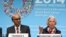 International Monetary Fund (IMF) Managing Director Christine Lagarde, accompanied by IMFC Chair and Singapore Finance Minister Tharman Shanmugaratnam, speaks during a news conference at World Bank Group-International Monetary Fund Spring Meetings in Wash