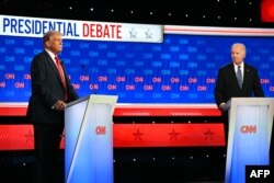 Presiden AS Joe Biden dan mantan Presiden AS dan calon presiden dari Partai Republik Donald Trump dalam debat presiden pertama Pemilu 2024 di studio CNN di Atlanta, Georgia, pada 27 Juni 2024. (Foto: AFP)