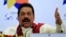 FILE - Sri Lankan President Mahinda Rajapaksa.