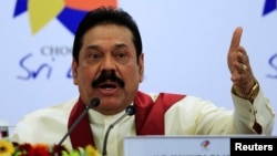 FILE - Sri Lankan President Mahinda Rajapaksa in Colombo, Nov. 17, 2013. 