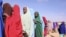 Women in Somaliland queue-up to cast ballots in municipal elections, November 28, 2012. (Credit: Kate Stanworth)