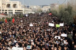 Protesters demonstrate over the U.S. airstrike in Iraq that killed Iranian Revolutionary Guard Gen. Qassem Soleimani in Tehran, Iran, Jan. 3, 2020.