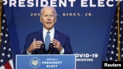 U.S. President-elect Joe Biden speaks to reporters about efforts to confront the coronavirus disease (COVID-19) pandemic after meeting with members of his "Transition COVID-19 Advisory Board" in Wilmington, Delaware, Nov. 9, 2020. 