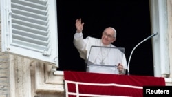 Pope Francis holds the Regina Caeli prayer at the Vatican