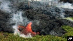 Lahar letusan Gunung Kilauea mengancam warga di kota Pahoa di Hawaii (26/10).