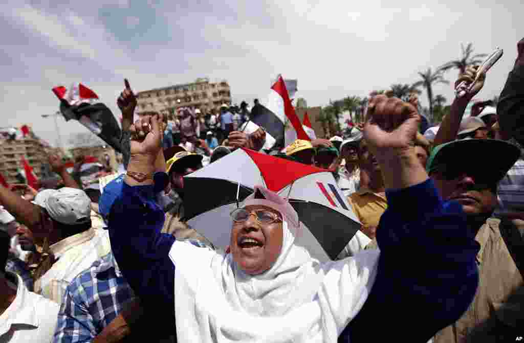 Egyptians chant slogans as they protest in Tahrir square in Cairo. (AP)