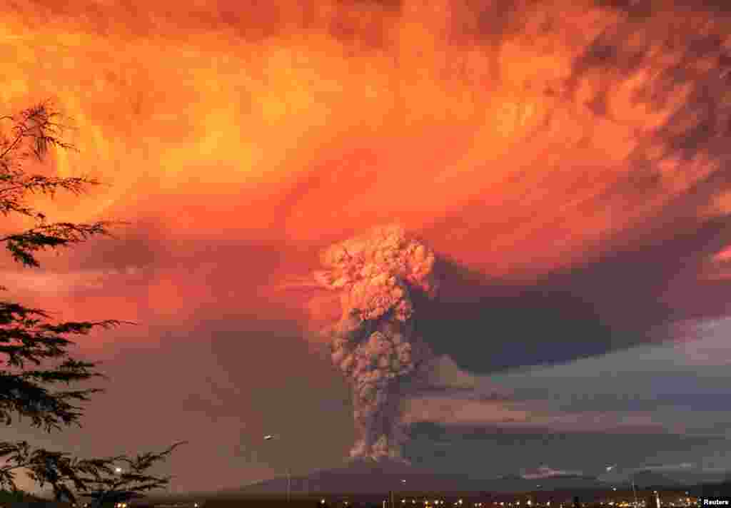 Smoke and ash rise from the Calbuco volcano as seen from the city of Puerto Montt, April 22, 2015.