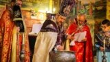 اصفهان، مراسم عشاء ربانی و غسل تعمید در کلیسای مریم.<br />
عکس: کاظم قانع، ایرنا