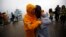 Family member of missing passengers who were on the South Korean ferry "Sewol" which sank in the sea off Jindo cry at a port where family members of missing passengers gathered in Jindo, April 18, 2014.