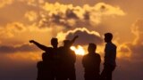 People watch the sun rise on New Year&#39;s Day in &quot;Gaviota Azul&quot; beach in Cancun, Mexico.