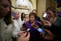 FILE - House Appropriations Committee Chair Nita Lowey, D-N.Y., talks with reporters on Capitol Hill, June 27, 2019.