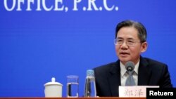 ফাইল ফটো-চীনের পররাষ্ট্র বিষয়ক উপমন্ত্রী ঝেং জেগুয়াং চীনের বেইজিংয়ে চীন এবং মার্কিন যুক্তরাষ্ট্রের মধ্যে বাণিজ্য আলোচনার অবস্থা নিয়ে একটি সংবাদ সম্মেলনে অংশ নেন।১৩ ডিসেম্বর ২০১৯।