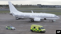 An ambulance carrying injured Pakistani teenager Malala Yousufzai leaves Birmingham airport, England on Oct. 15, 2012. 