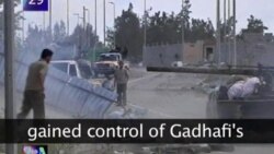 VOA60 - Reports say Gadhafi Killed