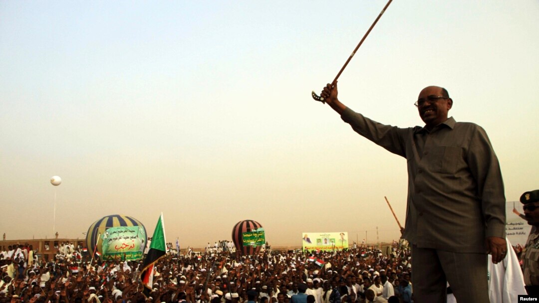 President Omar Hassan al-Bashir addresses crowd, North Khartoum, June 8, 2013.