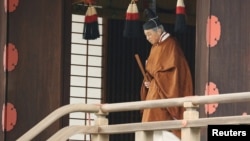 Japan's Emperor Akihito takes part in a ritual called Taiirei-Tojitsu-Kashikodokoro-Omae-no-gi, a ceremony for the Emperor to report the conduct of the abdication ceremony, at the Imperial Palace in Tokyo, Japan April 30, 2019. 