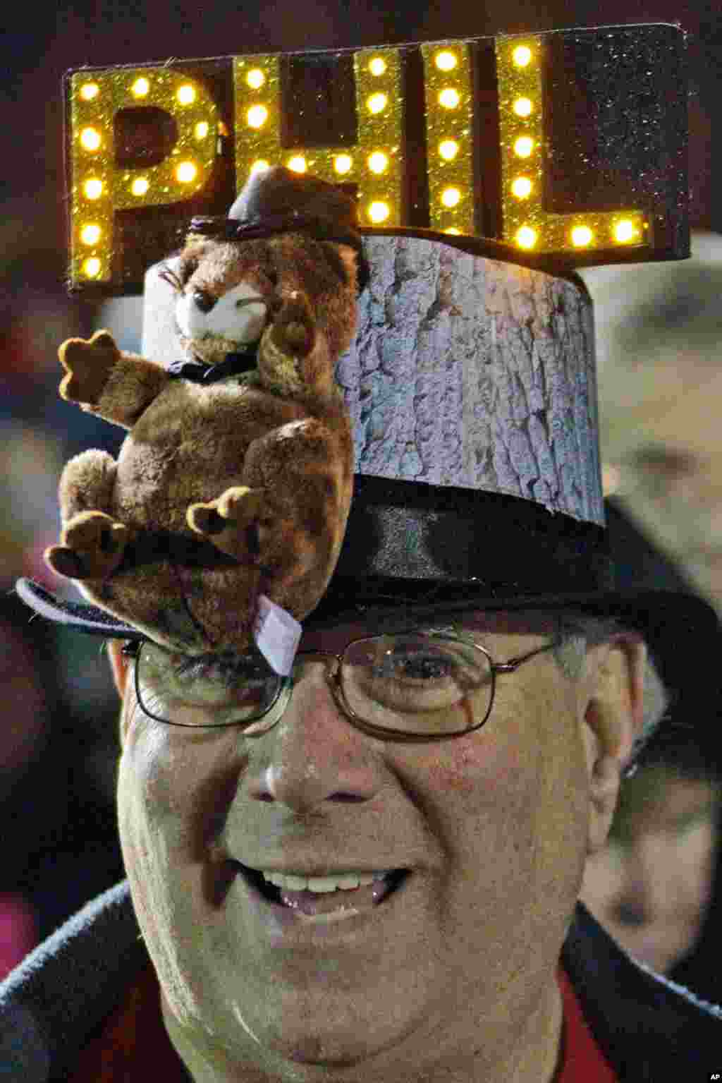 Fred Unger, a fan from York, Pa., waits for Punxsutawney Phil in the early morning. (AP)