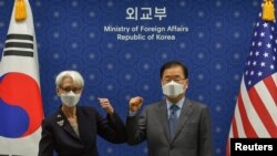 U.S. Deputy Secretary of State, Wendy Sherman and South Korean Foreign Minister Chung Eui-yong elbow bump prior to their meeting at the foreign ministry in Seoul, South Korea, July 22, 2021.