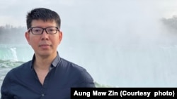资料照片：美籍缅甸裔学者敏辛在尼亚加拉大瀑布留影。(照片摄于2022年4月30日，由敏辛的弟弟Aung Maw Zin提供。)