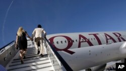 Pesawat Boeing 777-200LR milik Qatar Airways di Dubai Airshow, Dubai. (Foto: Dok)