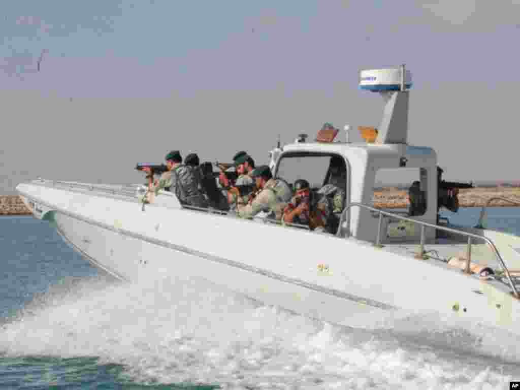 Iranian military personnel participate in war games on the Sea of Oman near the Strait of Hormuz in southern Iran December 28, 2011. (Reuters)