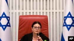 FILE - President of the Israeli Supreme Court Esther Hayut assembles to hear petitions against a law that would make it harder to remove a sitting prime minister at the court premises in Jerusalem, September 28, 2023. 