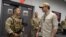 This handout picture provided by the U.S. Defense Department (DoD) shows Defense Secretary Pete Hegseth meeting with U.S. military personnel at Guantanamo Bay Naval Base, Feb. 25, 2025.