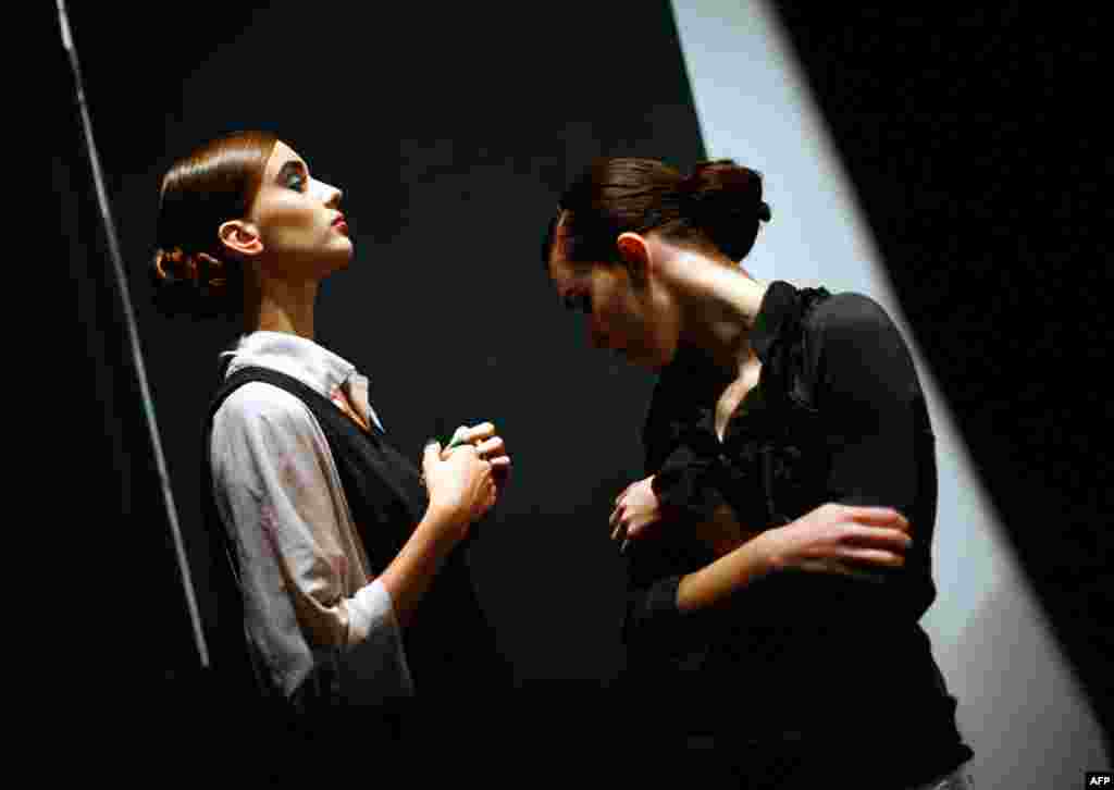September 15: Models wait backstage before the Naeem Khan Spring/Summer 2012 collection during New York Fashion Week. REUTERS/Eric Thayer