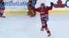 Washington Capitals left wing Alex Ovechkin celebrates the game-winning goal by teammate Troy Brouwer near the end of the NHL Winter Classic at Nationals Park in Washington, Jan. 1, 2015. 