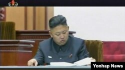 Pemimpin Korea Utara, Kim Jong Un, dalam sidang Majelis Tertinggi Rakyat Korut di Pyongyang (25/9).