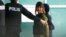 Vietnamese Doan Thi Huong who is on trial for the killing of Kim Jong Nam, the estranged half-brother of North Korea's leader, is escorted as she arrives at the Department of Chemistry in Petaling Jaya, near Kuala Lumpur, Malaysia October 9, 2017. 