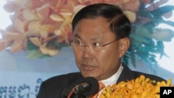 FILE - Cambodian business tycoon Ly Yong Phat delivers a speech during the Cambodia-China Business and Investment Forum on the outskirts of Phnom Penh, Cambodia, on Dec. 1, 2016.