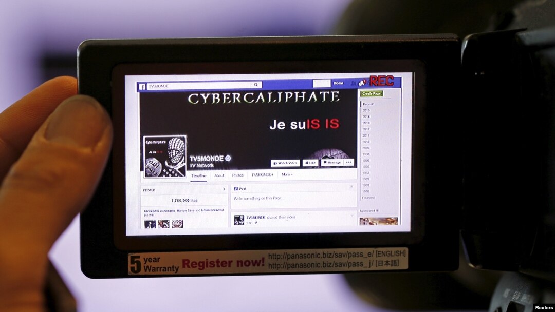 FILE - A screen grab of a hacked Facebook page of a French television network is seen on a camera viewer in Paris, April 9, 2015. U.S. Internet giants reached a deal with the EU Tuesday on ways to quickly tackle instances of online hate speech.