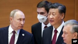 资料照：中国领导人习近平与俄罗斯总统普京在乌兹别克斯坦出席上海合作组织峰会期间会晤。（2022年9月16日）